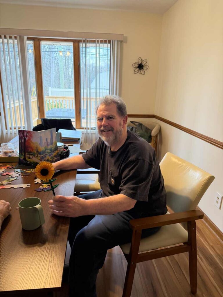 Resident at Assisted Living Facility Doing Puzzle